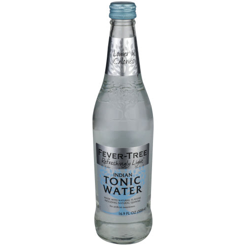A glass bottle with the word Fever Tree Premium Indian Tonic Water printed on a blue label